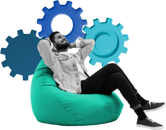 Man relaxing in bean bag chair with gears behind his head